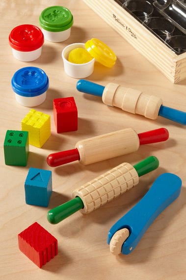 Modelling Clay with Wooden Sculpting Tools