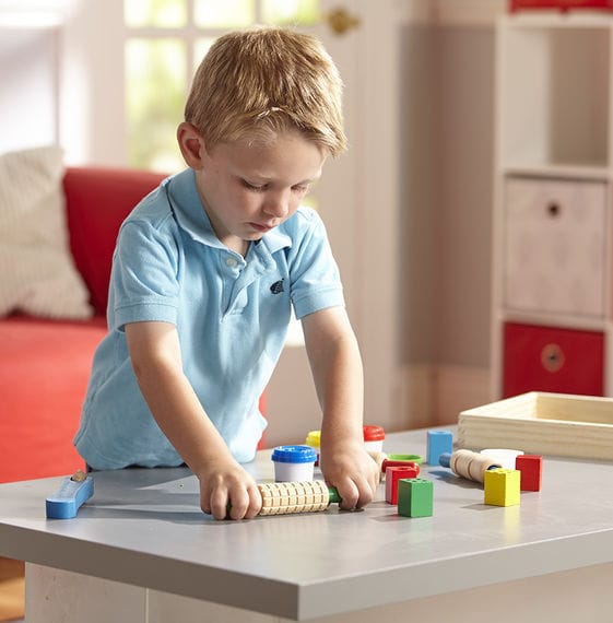 Modelling Clay with Wooden Sculpting Tools