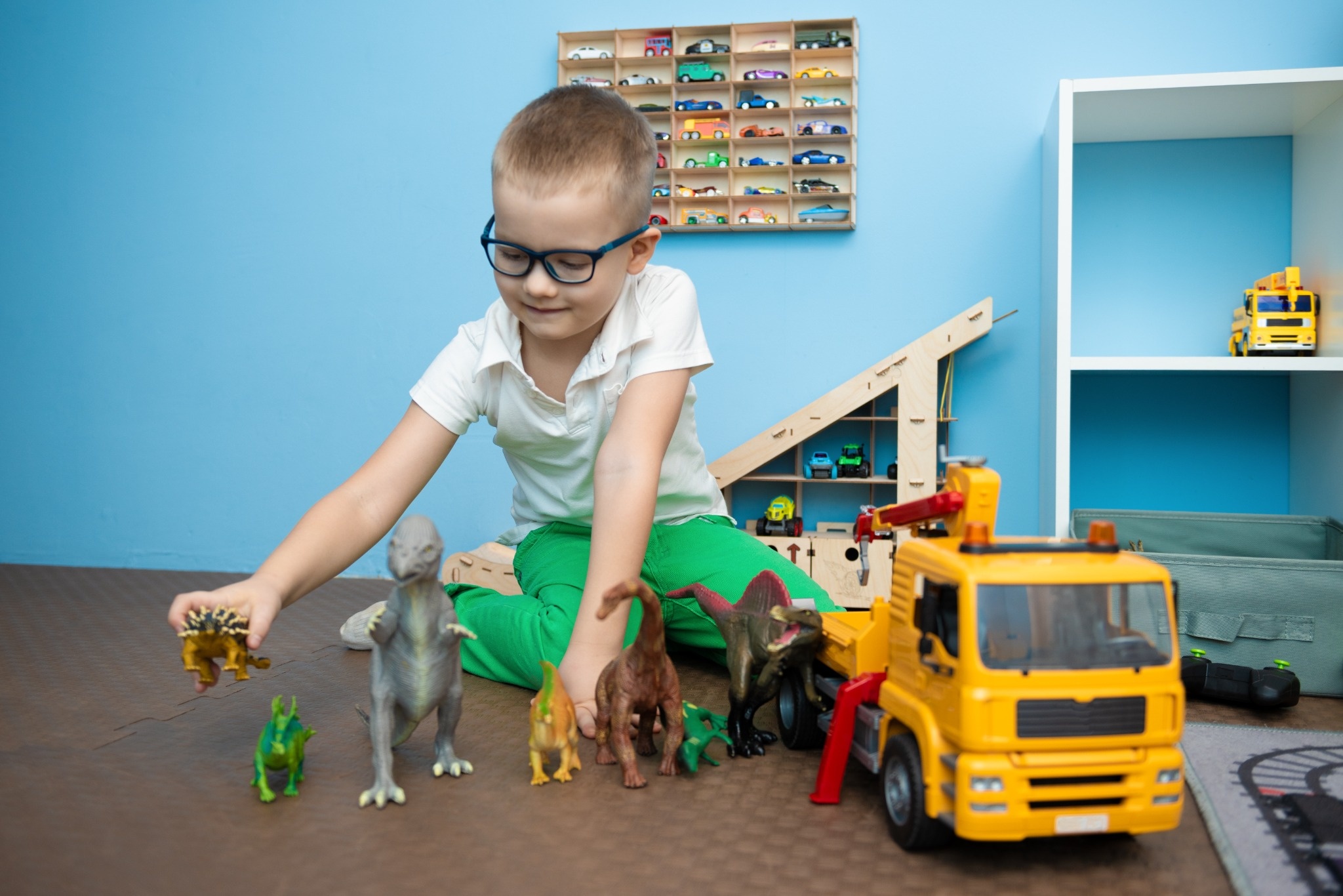 Little boy engaged in free and imaginative intuitive play